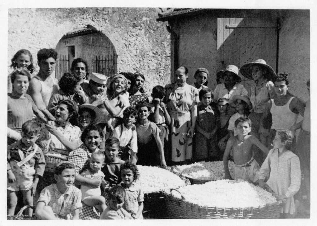 Helena Rubinstein and young workers at her villa in Grasse, France
